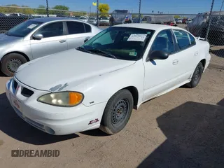 2005 Pontiac Grand Am SE with VIN 1G2NE52E05M215976, listed as a IAAI auction lot 42025657 with 220,418 mi miles. Bid and sale history available at carsss.com. Image 2.