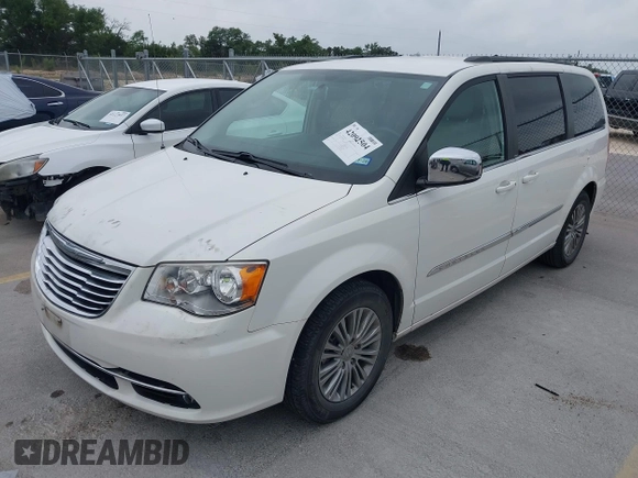 2013 Chrysler Town & Country Touring-L with VIN 2C4RC1CG2DR508799, listed as a IAAI auction lot 42092504 with 140,775 mi miles. Bid and sale history available at carsss.com. Image 2.
