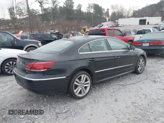 2014 Volkswagen CC Lux with VIN WVWRP7AN3EE537770, listed as a IAAI auction lot 41385247 with 135,069 mi miles. Bid and sale history available at carsss.com. Image 4.