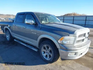 2009 Dodge 1500 Laramie z VIN 1D3HV13T29S778714, wystawiony jako IAAI lot #41364288 z przebiegiem 151 451 mil mil oraz . Historia ofert i sprzedaży dostępna na DreamBid. Obrazek 1.