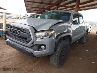 2019 Toyota Tacoma 4WD SR with VIN 3TMCZ5ANXKM225066, listed as a IAAI auction lot 41825265 with 75,908 mi miles. Bid and sale history available at carsss.com. Image 17.
