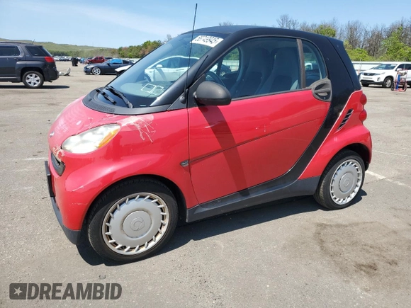 2009 Smart fortwo Pure with VIN WMEEJ31X49K322711, listed as a Copart auction lot 58749945 with 58,919 mi miles and Clean title. Bid and sale history available at DreamBid. Image 1.