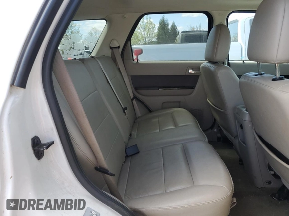 2010 Ford Escape Hybrid z VIN 1FMCU5K30AKC45288, wystawiony jako Copart lot #53479505 z przebiegiem 111 458 mil mil oraz Szkoda całkowita • Salvage title. Historia ofert i sprzedaży dostępna na DreamBid. Obrazek 11.