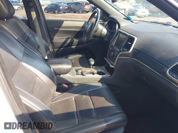 2014 Jeep Grand Cherokee Limited with VIN 1C4RJFBG9EC302183, listed as a IAAI auction lot 42635630 with 164,836 mi miles and . Bid and sale history available at DreamBid. Image 5.