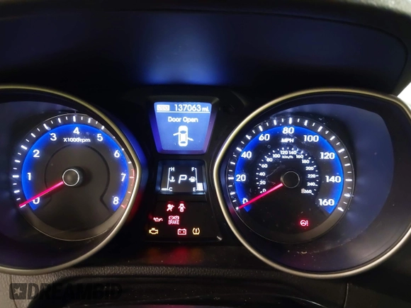 2013 Hyundai Elantra GT with VIN KMHD35LE2DU105677, listed as a IAAI auction lot 42027623 with 137,063 mi miles. Bid and sale history available at carsss.com. Image 7.