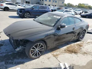 2022 BMW 4 Series 430i with VIN WBA53AP04NCJ13266, listed as a Copart auction lot 77759714 with 26,487 mi miles and Salvage Title. Bid and sale history available at carsss.com. Image 1.