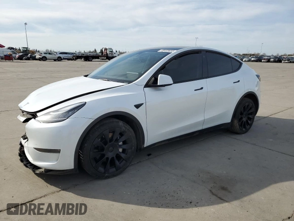 2023 Tesla Model Y Long Range z VIN 7SAYGDEE2PA065048, wystawiony jako Copart lot #48403655 z przebiegiem 56 553 mil mil oraz Szkoda całkowita • Salvage title. Historia ofert i sprzedaży dostępna na DreamBid. Obrazek 1.