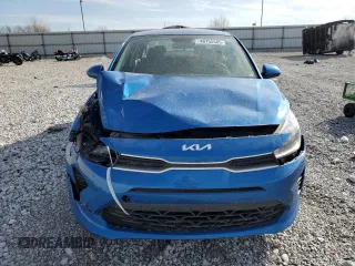 2023 Kia Rio S z VIN 3KPA24AD2PE529734, wystawiony jako Copart lot #48755585 z przebiegiem 99 031 mil mil oraz Szkody całkowita. Historia ofert i sprzedaży dostępna na DreamBid. Obrazek 5.