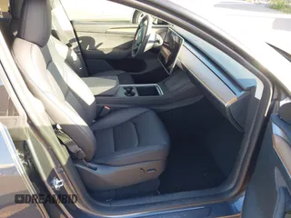 2023 Tesla Model Y Long Range with VIN 7SAYGDEE0PF928836, listed as a IAAI auction lot 41538742 with 9,630 mi miles and . Bid and sale history available at DreamBid. Image 5.