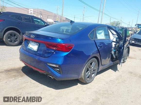 2021 Kia Forte GT-Line z VIN 3KPF34AD6ME284046, wystawiony jako IAAI lot #42231501 z przebiegiem 97 877 mil mil oraz . Historia ofert i sprzedaży dostępna na DreamBid. Obrazek 4.