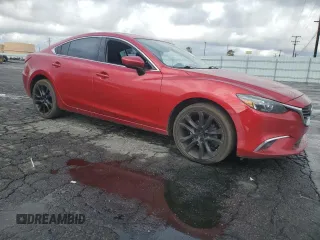 2016 Mazda 6 i Grand Touring with VIN JM1GJ1W56G1468307, listed as a Copart auction lot 87386504 with 158,841 mi miles and Salvage Title. Bid and sale history available at DreamBid. Image 4.