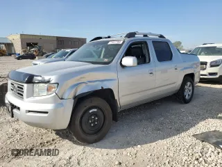 2007 Honda Ridgeline RTL w/Leather with VIN 2HJYK16597H523122, listed as a Copart auction lot 71617764 with 253,097 mi miles and Salvage Title. Bid and sale history available at carsss.com. Image 1.