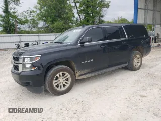 2018 Chevrolet Suburban LT with VIN 1GNSCHKC8JR331662, listed as a Copart auction lot 55561545 with 164,213 mi miles and Salvage title. Bid and sale history available at DreamBid. Image 1.