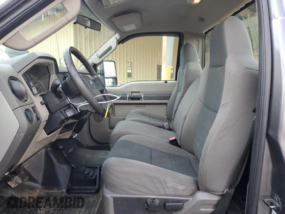 2010 Ford F-250 XL with VIN 1FTNF2B57AEB11030, listed as a Copart auction lot 84527444 with 59,922 mi miles and Salvage title. Bid and sale history available at DreamBid. Image 7.