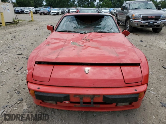 1984 Porsche 944 z VIN WP0AA0945EN454696, wystawiony jako Copart lot #61697004 z przebiegiem 66 607 mil mil oraz Czysty tytuł • Clean title. Historia ofert i sprzedaży dostępna na DreamBid. Obrazek 5.