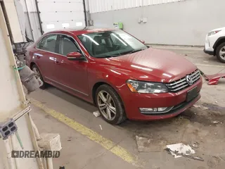 2015 Volkswagen Passat SEL Premium z VIN 1VWCV7A33FC090555, wystawiony jako IAAI lot #41904819 z przebiegiem 69 863 mil mil oraz . Historia ofert i sprzedaży dostępna na DreamBid. Obrazek 1.