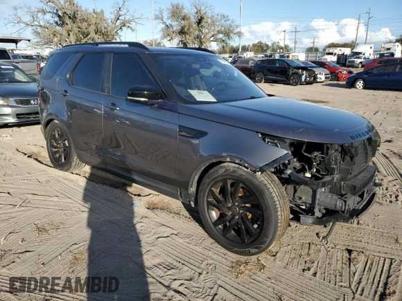 2018 Land Rover Discovery with VIN SALRG2RK3JA050818, listed as a Copart auction lot 77161734 with 86,341 mi miles and Salvage Title. Bid and sale history available at DreamBid. Image 4.