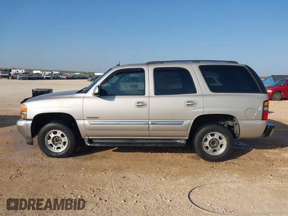 2005 GMC Yukon SLT with VIN 1GKEK13T95R203827, listed as a IAAI auction lot 41815086 with 136,671 mi miles. Bid and sale history available at carsss.com. Image 14.