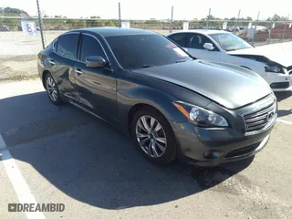 2011 Infiniti M37 with VIN JN1BY1AP4BM321931, listed as a IAAI auction lot 40914347 with 115,041 mi miles. Bid and sale history available at carsss.com. Image 1.