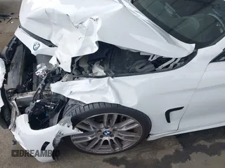2016 BMW 4 Series 428i with VIN WBA4A9C50GGL88212, listed as a IAAI auction lot 42354415 with 95,647 mi miles and . Bid and sale history available at DreamBid. Image 18.