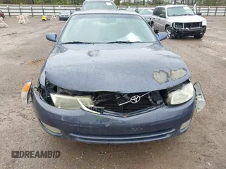 1999 Toyota Solara SE with VIN 2T1CF22P9XC113933, listed as a IAAI auction lot 41975806 with 239,883 mi miles. Bid and sale history available at carsss.com. Image 6.