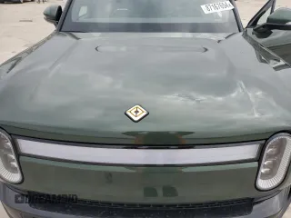 2024 Rivian R1S Adventure with VIN 7PDSGABA6RN041211, listed as a Copart auction lot 87167654 with Not Provided miles and Salvage Title. Bid and sale history available at carsss.com. Image 13.