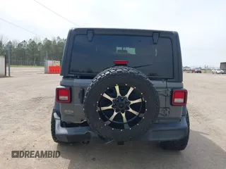 2021 Jeep Wrangler Sport z VIN 1C4GJXAN3MW550665, wystawiony jako IAAI lot #41902279 z przebiegiem 32 250 mil mil oraz . Historia ofert i sprzedaży dostępna na DreamBid. Obrazek 6.