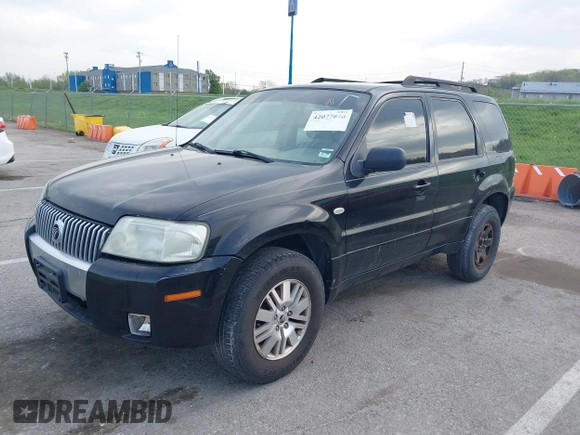 2007 Mercury Mariner Premier z VIN 4M2CU87167KJ19694, wystawiony jako IAAI lot #42077870 z przebiegiem 219 031 mil mil oraz . Historia ofert i sprzedaży dostępna na DreamBid. Obrazek 2.