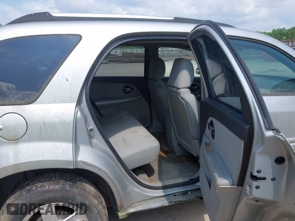 2005 Chevrolet Equinox LS z VIN 2CNDL23F356008964, wystawiony jako IAAI lot #42457228 z przebiegiem Nie podano mil oraz . Historia ofert i sprzedaży dostępna na DreamBid. Obrazek 8.