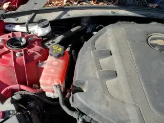 2018 Chevrolet Camaro 1LT z VIN 1G1FB3DS8J0104344, wystawiony jako Copart lot #52549395 z przebiegiem 89 712 mil mil oraz Szkoda całkowita • Salvage title. Historia ofert i sprzedaży dostępna na DreamBid. Obrazek 13.