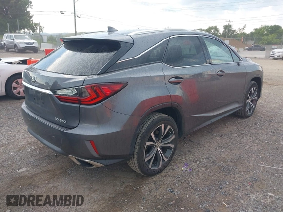 2016 Lexus RX 350 with VIN 2T2ZZMCA6GC025134, listed as a IAAI auction lot 42571066 with 108,958 mi miles and . Bid and sale history available at DreamBid. Image 4.