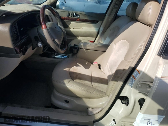 2002 Lincoln Continental with VIN 1LNHM97V32Y694132, listed as a Copart auction lot 76410144 with 0 mi miles and Non Repairable. Bid and sale history available at carsss.com. Image 7.