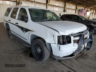 2012 Chevrolet Tahoe Commercial with VIN 1GNLC2E00CR295536, listed as a Copart auction lot 53904535 with 140,719 mi miles and Salvage title. Bid and sale history available at DreamBid. Image 4.