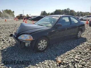 1997 Honda Civic DX with VIN 1HGEJ6228VL123265, listed as a Copart auction lot 74078684 with 49,904 mi miles and Salvage Title. Bid and sale history available at carsss.com. Image 1.
