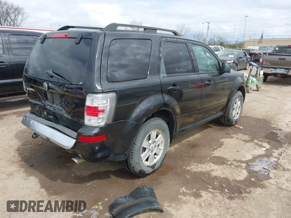 2011 Mercury Mariner with VIN 4M2CN8B7XBKJ01717, listed as a IAAI auction lot 42030587 with 115,766 mi miles and . Bid and sale history available at DreamBid. Image 4.