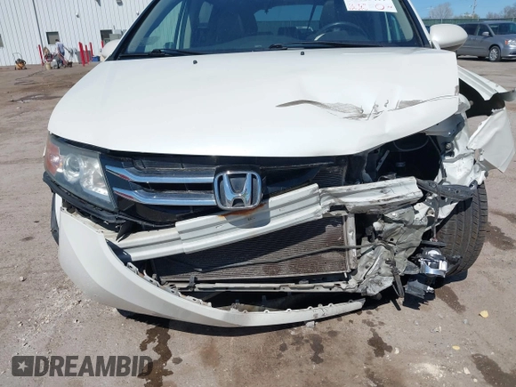 2016 Honda Odyssey EX-L z VIN 5FNRL5H65GB055317, wystawiony jako IAAI lot #41825497 z przebiegiem 117 672 mil mil oraz . Historia ofert i sprzedaży dostępna na DreamBid. Obrazek 6.