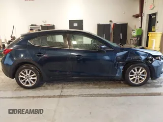 2016 Mazda 3 i Touring with VIN JM1BM1L71G1343674, listed as a IAAI auction lot 41630218 with 70,052 mi miles and . Bid and sale history available at DreamBid. Image 13.