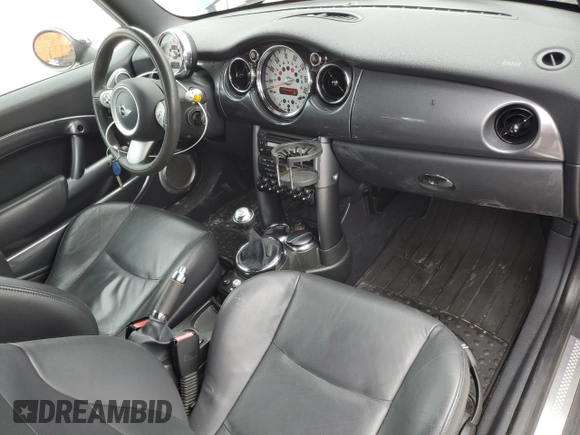 2007 MINI Convertible S with VIN WMWRH33567TJ45123, listed as a Copart auction lot 55702735 with 60,117 mi miles and Salvage title. Bid and sale history available at DreamBid. Image 8.