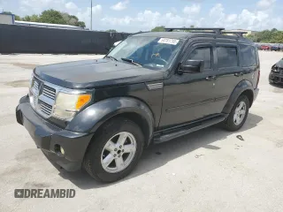 2007 Dodge Nitro SLT z VIN 1D8GT58K77W561510, wystawiony jako Copart lot #60781755 z przebiegiem 159 445 mil mil oraz Szkoda całkowita • Salvage title. Historia ofert i sprzedaży dostępna na DreamBid. Obrazek 1.