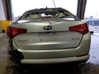 2013 Kia Optima EX с VIN 5XXGN4A70DG239393, выставлен на аукционе Copart как лот 41923615 с пробегом Не указан миль и Списание • Salvage title. История ставок и продаж доступна на DreamBid. Изображение 6.