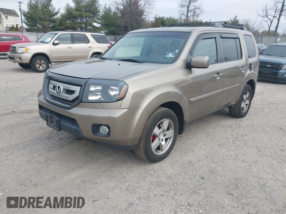2011 Honda Pilot EX-L with VIN 5FNYF4H68BB038615, listed as a IAAI auction lot 41785830 with 164,324 mi miles and . Bid and sale history available at carsss.com. Image 18.