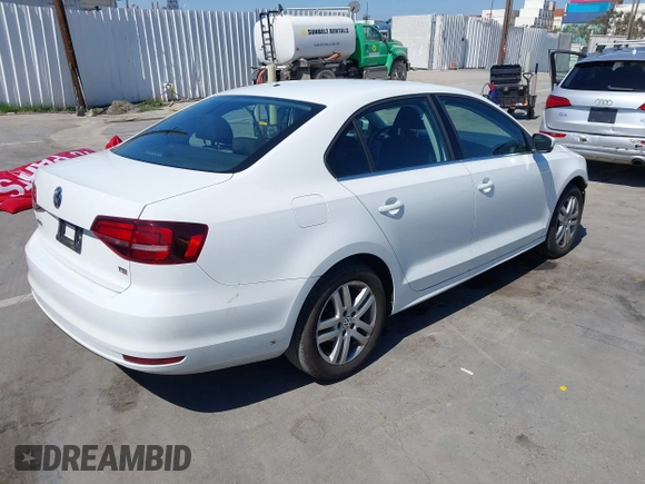 2017 Volkswagen Jetta S with VIN 3VW2B7AJ0HM356506, listed as a IAAI auction lot 42687156 with 96,962 mi miles and . Bid and sale history available at DreamBid. Image 4.