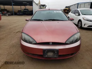1999 Mercury Cougar z VIN 1ZWFT61L0X5760822, wystawiony jako Copart lot #66851824 z przebiegiem 128 109 mil mil oraz Tytuł czysty. Historia ofert i sprzedaży dostępna na DreamBid. Obrazek 5.