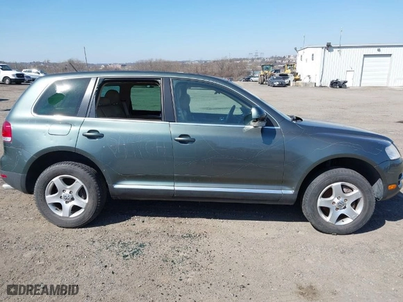 2006 Volkswagen Touareg 3.2L V6 with VIN WVGZG77L16D004762, listed as a IAAI auction lot 41763692 with 93,027 mi miles. Bid and sale history available at carsss.com. Image 14.