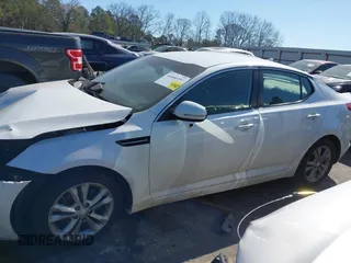 2012 Kia Optima EX with VIN 5XXGN4A70CG028435, listed as a IAAI auction lot 41640394 with 153,000 mi miles. Bid and sale history available at carsss.com. Image 14.