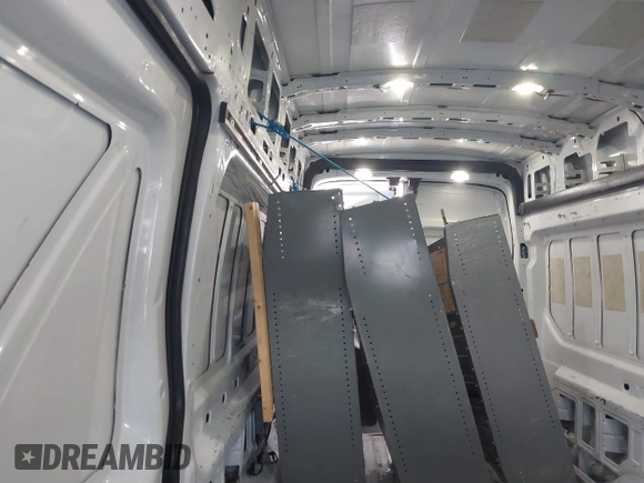 2017 Ford Transit Cargo with VIN 1FTBW3XG9HKA80524, listed as a IAAI auction lot 37520715 with 98,524 mi miles. Bid and sale history available at carsss.com. Image 8.
