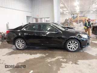 2013 Chevrolet Malibu LTZ with VIN 1G11H5SA1DU129095, listed as a IAAI auction lot 41556006 with 170,477 mi miles and . Bid and sale history available at DreamBid. Image 13.