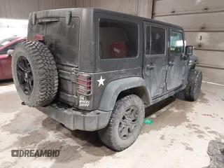 2016 Jeep Wrangler Unlimited Sport with VIN 1C4BJWDG2GL210060, listed as a IAAI auction lot 41546979 with 13,542 mi miles and . Bid and sale history available at DreamBid. Image 4.