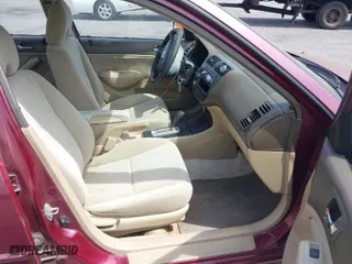 2003 Honda Civic LX with VIN 2HGES16583H571200, listed as a IAAI auction lot 42103633 with 177,302 mi miles. Bid and sale history available at carsss.com. Image 5.