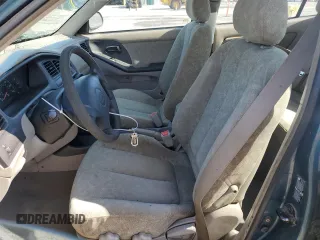 2001 Hyundai Elantra GLS with VIN KMHDN45D21U109684, listed as a Copart auction lot 51888855 with 174,105 mi miles and Salvage title. Bid and sale history available at DreamBid. Image 7.